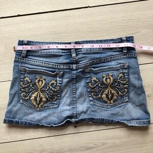 Y2K mini jean skirt with studs and embroidered pockets